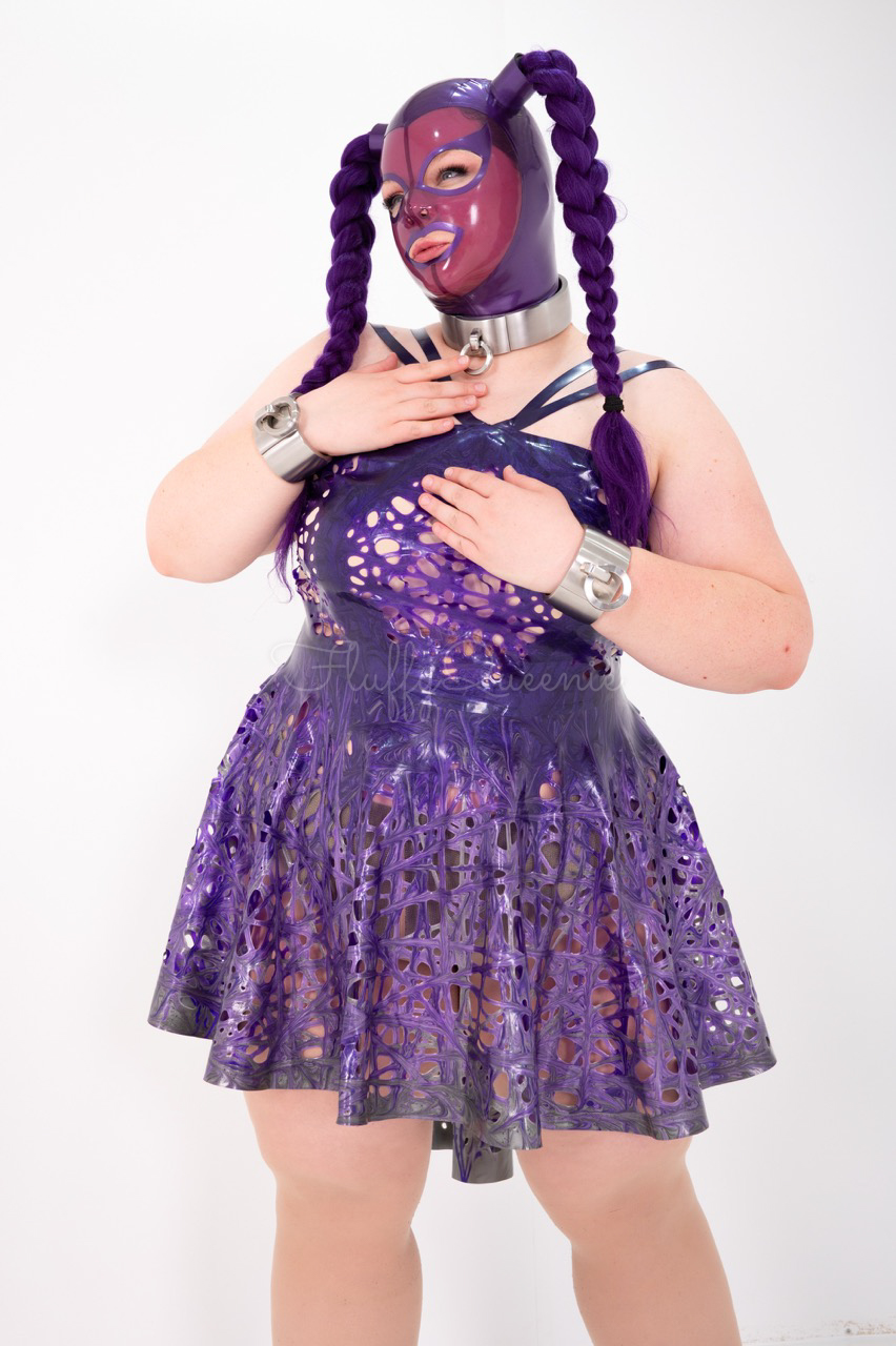 Plus Size Girl wearing a purple mask and purple dress.